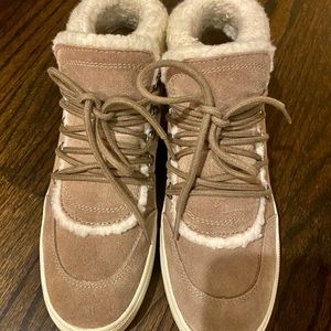 Beige suede booties that were worn once.